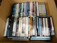 Box of mixed DVDs