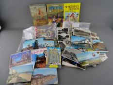 Quantity of worldwide and other vintage postcards, loose stamps and vintage children's books