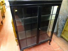 Black painted two door glazed bookcase and a mahogany effect TV cabinet