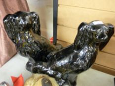 Pair of black Staffs dogs