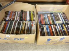 Two boxes containing large quantity of mixed DVDs (approx 100)