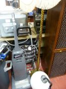 Parcel comprising Panasonic upright vacuum cleaner, shopping trolley on wheels, brass effect