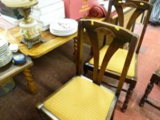 Polished wood draw leaf dining table and four drop-in seats