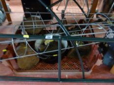 Parcel of items comprising garden arch, metal spiral, garden frames and basket of various items