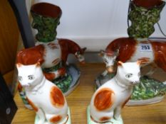 Pair of Staffs cow spillholders and a pair of Staffs cats