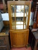Oak glass topped display cabinet