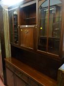 Dark wood lounge unit of good quality