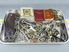 Three vintage brass padlocks, collection of various keys, small Art Deco alarm clock etc