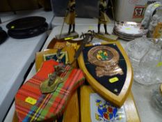 Wall hanging shield/coat of arms, a pair of Egyptian figurines and an ornamental dagger