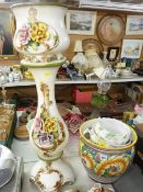 Pottery jardiniere on stand, a large floral decorated planter etc