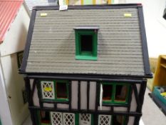 Tudor style doll's house and miscellaneous contents