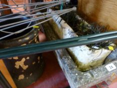 Stone garden planter, another oblong planter and a circular painted chimney pot