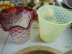 Two large glass oil lampshades in vaseline with hatched design, the other diamond patterned with