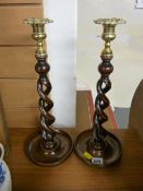 Good pair of oak open barley twist candlesticks with brass sconces