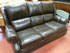 Dark brown leather three seater settee