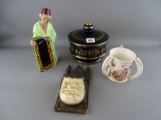 Crown Ducal figure of a carpet seller, a Greek bowl and cover decorated in 24 carat gold, a German