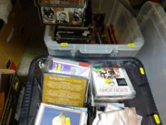 Two plastic tubs of DVDs, CDs etc