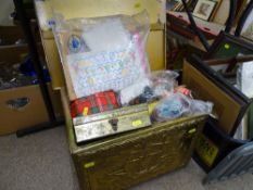 Repousse brass lidded slipper box containing a quantity of needlework goods and haberdashery