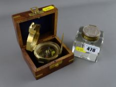 Vintage glass inkwell with 'Conway Coin' top and a reproduction brass compass marked 'Stanley,