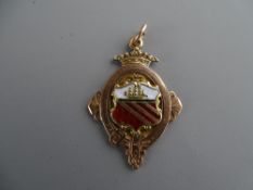 Nine carat gold enamel decorated pendant fob, 9.8 grms