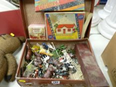 Vintage small suitcase with quantity of metal farm and similar animals, domino set etc