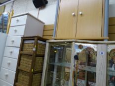 Wooden frame with four seagrass drawers and a small modern two door cupboard