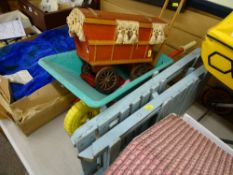 Child's wheelbarrow, two folding wooden chairs and a toy gypsy caravan
