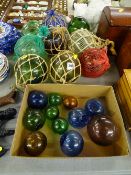 Good collection of large and small glass fishing net floats
