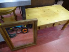 Pine coffee table with two small drawers and a pine framed mirror