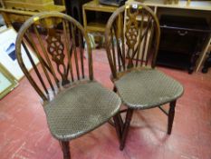 Pair of spindleback and upholstered chairs