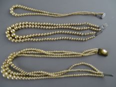 Three graduated pearl necklaces