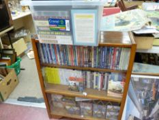Vintage bookcase and a crate of railway and steam related DVDs, videos etc