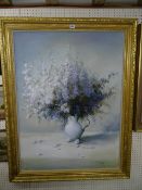 J LEVIN gilt framed still life study of a vase with flowers