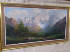 Large gilt framed oil on canvas - snow covered Alps with a tree lined valley road to the foreground,