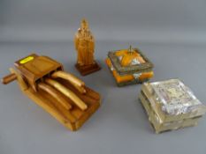 Carved Oriental wooden figure, mother of pearl decorated box and one other and a carved wooden
