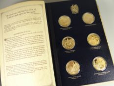 A folder of John Pinches 'The Churchill Centenary Medals'