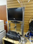A Panasonic 28-inch flatscreen TV with stand & a modern eight-branch standard lamp etc E/T