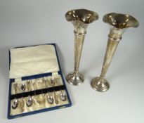 A pair of hallmarked silver trumpet vases together with a cased set of EPNS spoons