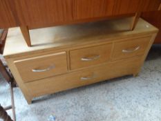 A 1960s teak G-Plan style ottoman / storage unit together with a light oak four-drawer base coffee