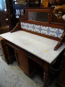 A vintage marble top with tile & mirror back wash stand