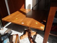 A pair of tall square darkwood pub / poser tables together with another oak pub table
