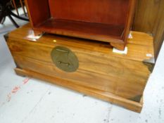 A Chinese wooden chest with ornate locking plate & carry handles