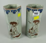 A pair of Royal Doulton 'Titanian' hexagonal vases decorated with a smoking dog