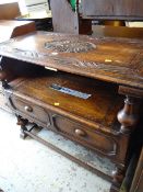 A nicely carved oak monk's bench with box seat & tray top