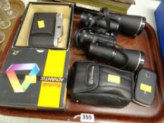 Pair of Tasco binoculars, vintage cameras, mobile phone