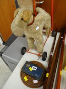 A vintage child's dog walker together with a vintage solitaire set with marbles