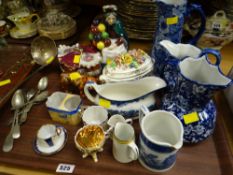 A tray of mixed china & flatware including a large ladle etc