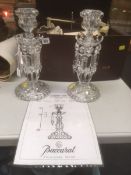 A pair of Baccarat, Paris lustre candlestick holders, large vase etc