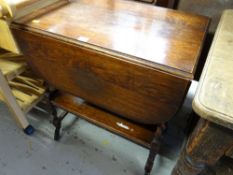 A vintage oak drop leaf tea trolley together with a modern kitchen preparation table