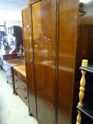 A vintage bedroom suite comprising single-door wardrobe, three-drawer chest of drawers & dressing